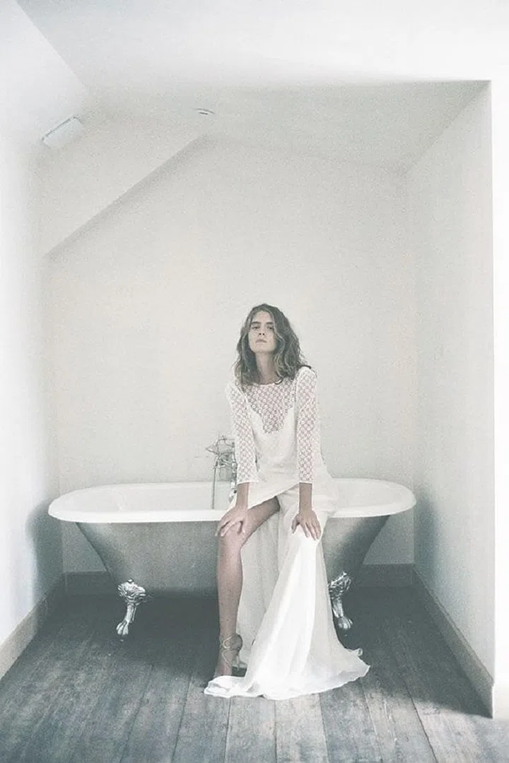 With a background styling for international fashion publications, designer Donatelle Godart knows what it takes for brides to have an inherent sense of style. Infusing her Parisian je ne sais quoi into each silhouette, Godart consistently channels 70's vibes, turning to David Hamilton and Jane Birkin for inspiration. The fabrics are always luxe despite the brand's accessible price point, and unlike lines that focus on slips and bias cuts–these actually flatter on a wide variety of body shapes and sizes. Think "laissez faire, French girl vibes with a little bit of Ossie Clark thrown in," says experienced bridal shopper, bride-to-be and BAZAAR.com editor Olivia Fleming.