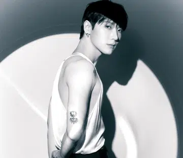 Ten Lee in Saint Laurent and Cartier