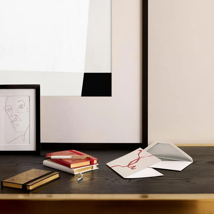 Diabolo de Cartier leather notebooks (set of 3); Entrelacés de Cartier cards and envelopes