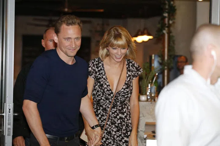 Look how in love they were? LOOK. AT. TOM'S. FACE.