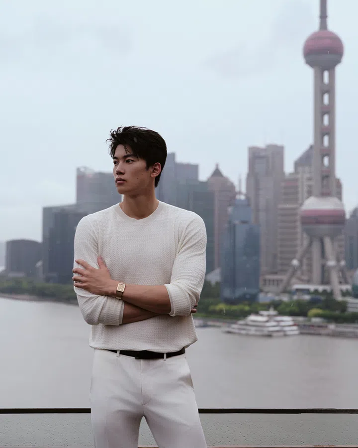 olympian wang shun wearing white sweater pants jaeger lecoultre reverso | the dream shaper exhibition shanghai