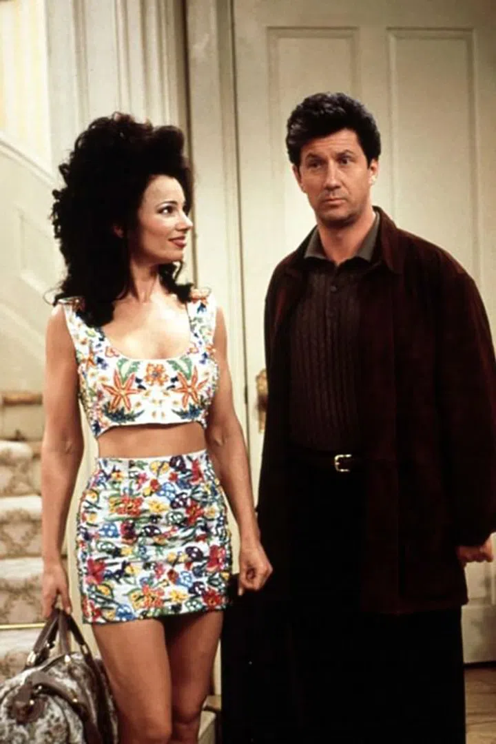 With her designer skirt suits, body-hugging dresses, and matching two-piece sets, Fran Fine not only became the most stylish nanny of all-time, but one of the most stylish characters to ever grace our televisions.

Photo: Getty