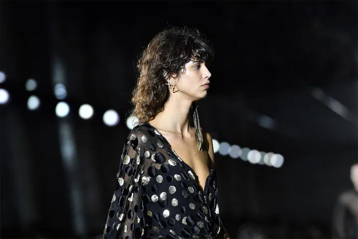Hedi Slimane infamously discarded the Yves in Yves Saint Laurent, rebranding the label as simply Saint Laurent. It didn't take at first but Slimane committed to the new name and eventually everyone was reverentially murmuring Saint Laurent and coveting the bags and the boots. Photo: Getty