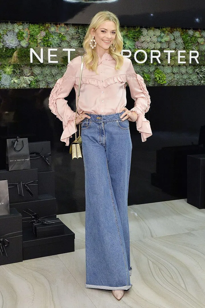 Choose jeans in an oversized shape, ensuring that they're cut high at the waist. Pair with a feminine blouse to avoid any teenage skater girl comparisons. Photo: Getty 