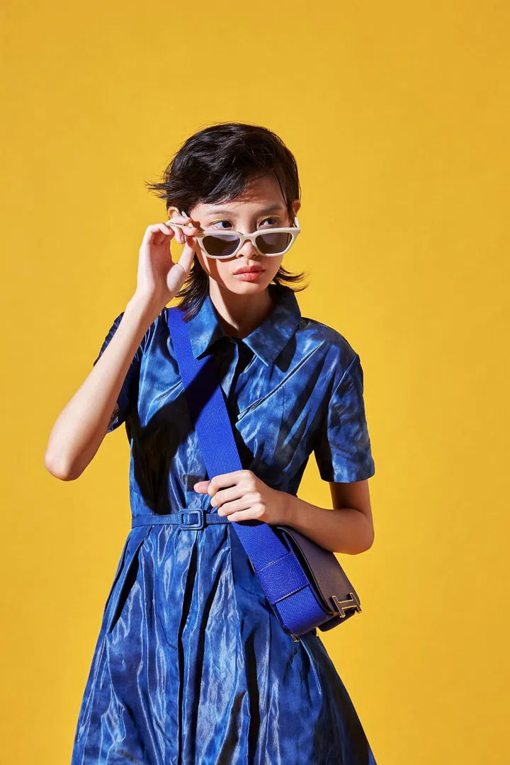Dress, from Dior. Sunglasses, from Gentle Monster. Bag, from Hermès