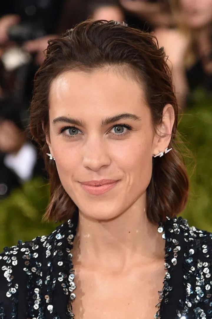 Who says short haircuts are boring? Muss up your hair at the roots with a bit of gel spray like Alexa Chung for rock 'n' roll texture.