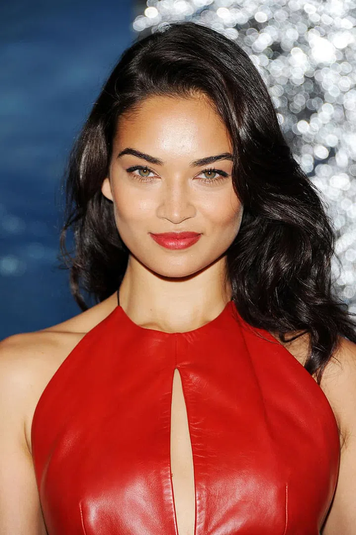 A creamy red was an ideal accent to the model's leather dress.
