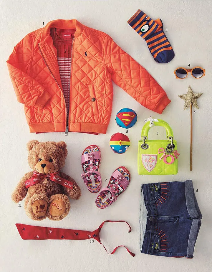 1. Jacket, $290, Ralph Lauren Children 2. Knitted Top, from $150 onwards, Ferrari Store Junior 3. Socks, $70, FENDI 4. Sunglasses, $130, Zoobug London at Kids 21 5. Wand, $50, Bonpoint 
6. Shorts, $140, Stella McCartney Kids 7. Bag, $4,200, Baby Dior 8. Cupcakes, $8.90 each, 
DC Comics Super Heroes Cafe 9. Sandals, $670, Dolce&Gabbana Junior 10. Tie, $66, 
Ferrari Store Junior 11. Teddy bear, $56.90, Hamleys of London