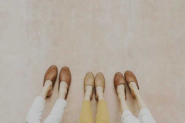Our Barehands' leather slides. Photo: IKI Company