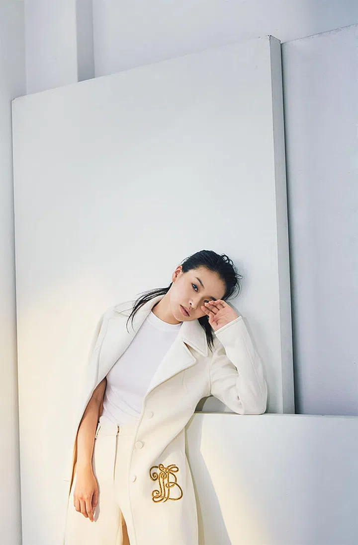 Coat, pants. T-shirt (worn throughout), stylist's own