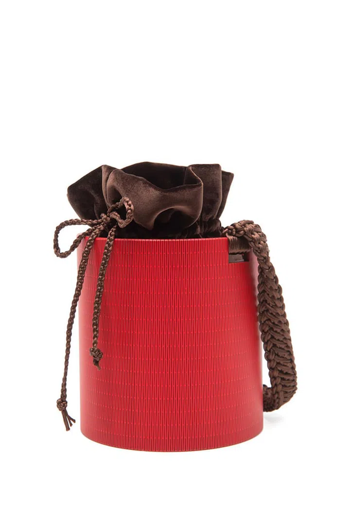 0711 Tbilisi is a US brand that hails from Georgia and the products are handmade there as well. If you're looking for a twist to the ever-popular bucket bag, their Bali bucket bag is the one to go for. Made of wood that's laser cut to give details and dimension as well as a removable brown velvet pouch, this is for the silent statement-makers that love sustainable fashion. 