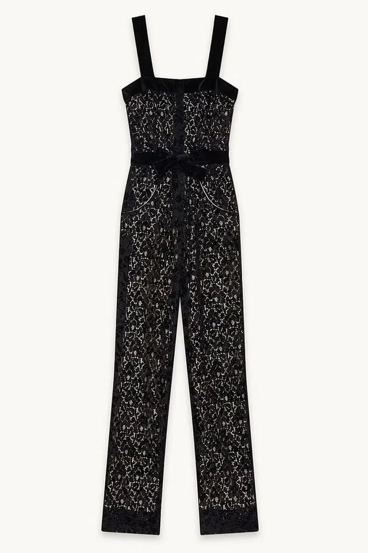 Maje's take on the Little Black Jumpsuit comes by way of lace and flocking. The waist bow is ideal for adding a little definition and shape. 