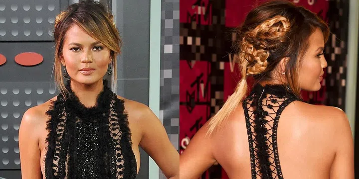 Tone down intricate twists from behind with a loose, layered look in the front.