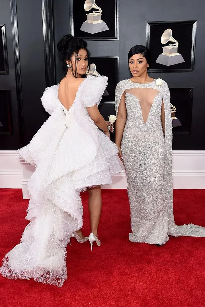 These sassy sisters are serving up serious attitude and just the right amount of skin.  Photo: Getty