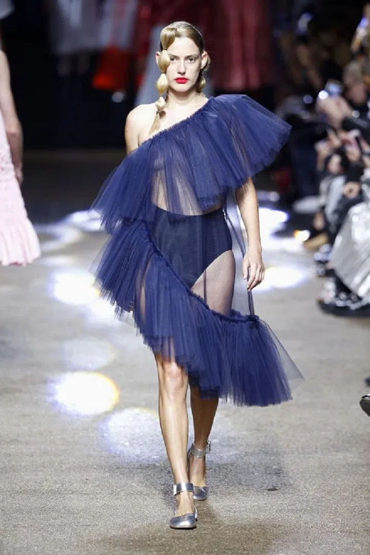 Based In: London. Though she's got a couple of seasons under her belt already, Molly Goddard is still in the early stages of her rising fashion stardom. Back in December, the designer won the British Emerging Talent Award at the 2016 Fashion Awards, making her an immediate force to be reckoned with on the London fashion scene. Goddard's Spring 2017 collection was full of dreamy and playful runway looks including plenty of tulle, ruffle and girly color palettes—paving her way as one to watch for whimsical designs. 