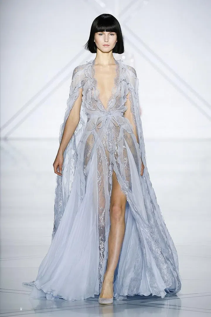 She is already having quite the season on the red carpet – from Alexander McQueen at the SAG Awards to starry Valentino at the Globes – and we think this lacy, girlie gown from Ralph & Russo would be the perfect dress to finish it off.