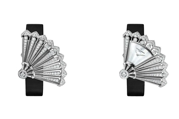 Based on a timepiece developed by Vacheron Constantin in the 1920s, the Heure Discréte reveals the time exactly the way you think it should—with a flick of the wrist. The coy timepiece is playfully masked by 306 diamonds encrusting the delicate lace-like fan. Available on a black satin strap of a fully diamond bracelet, the watch is a prime example of glamorous art deco abandon. 
Price Upon Request. vacheron-constantin.com