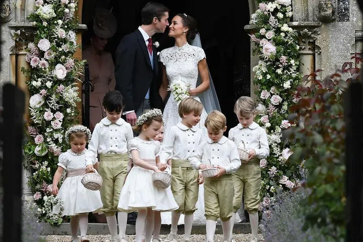 Prince George makes for the cutest pageboy at Pippa Middleton's wedding in Englefield Green, England.
