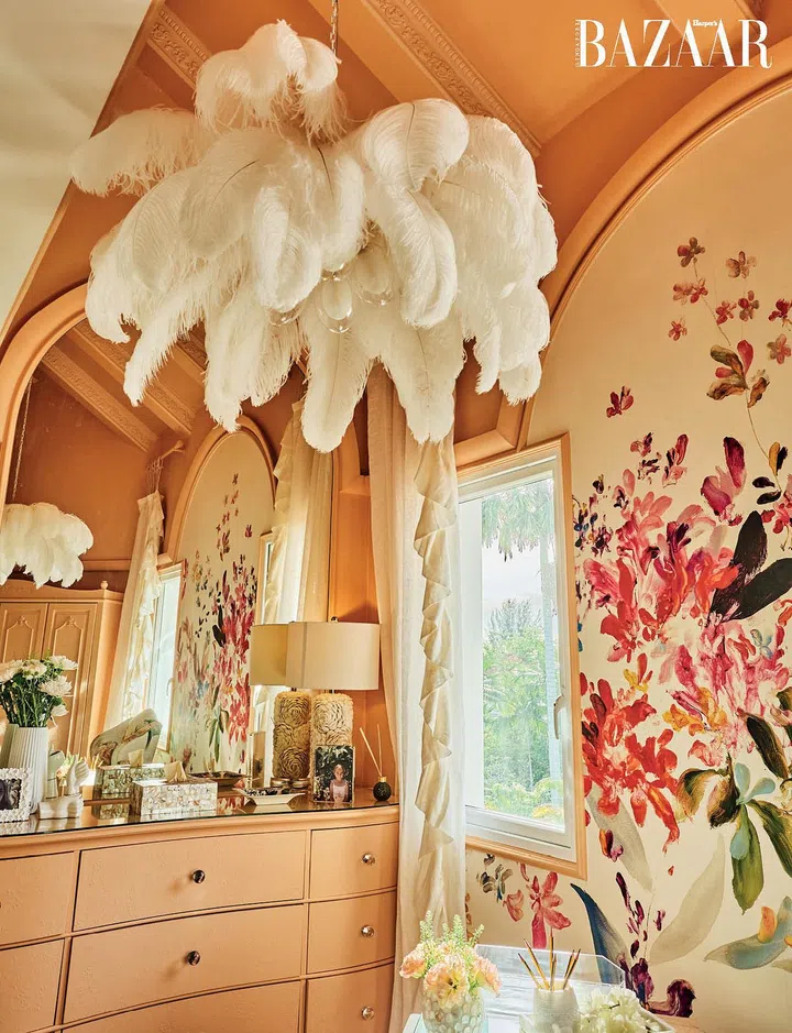 An ostrich feather lamp is the centrepiece of her work space. 