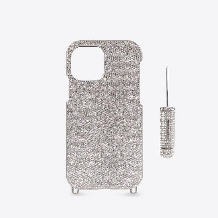 Glam Phone Case in Silver, $2,690, Balenciaga 