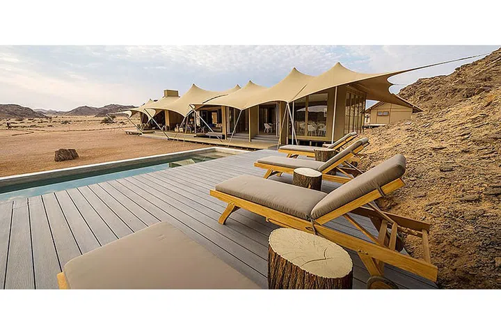 The rural location of the Hoanib Skeleton Coast camp makes it ideal for spotting wildlife in its natural desert habitat. Hop in a Jeep for a game drive with an expert, pick a wildlife researcher's brain, or take a scenic flight along the Skeleton Coast – it's all included. 