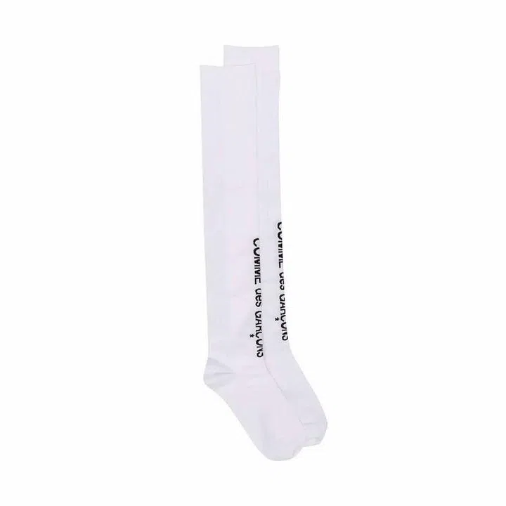 Logo-Print Socks, $125, Comme Des Garçon at Farfetch