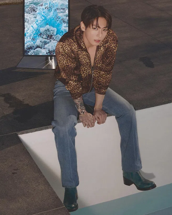 harper’s bazaar singapore june 2026 cover story | jung kook wearing ernest w baker leopard print jacket, jeans and hublot classic fusion racing grey king gold watch