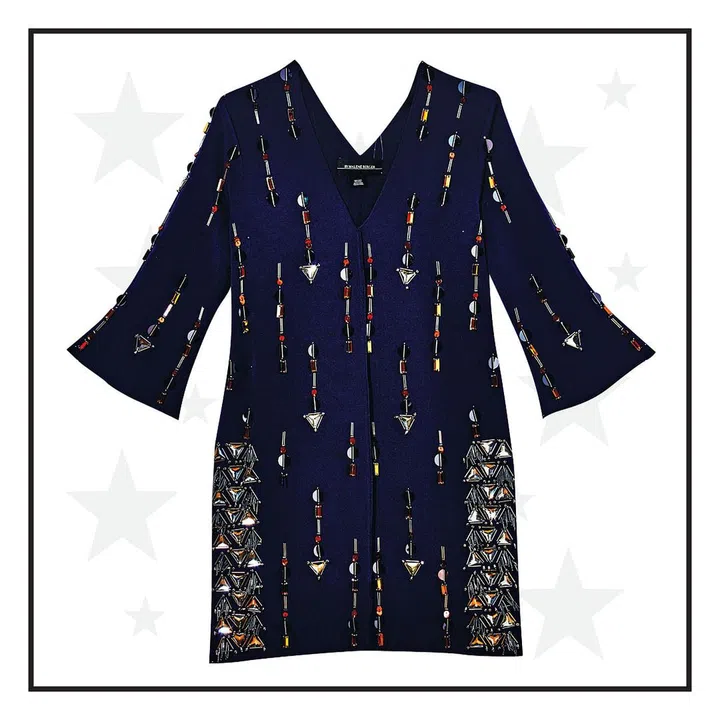 'Tis the season to be jolly, and this piece's embellishments are nothing if not that.