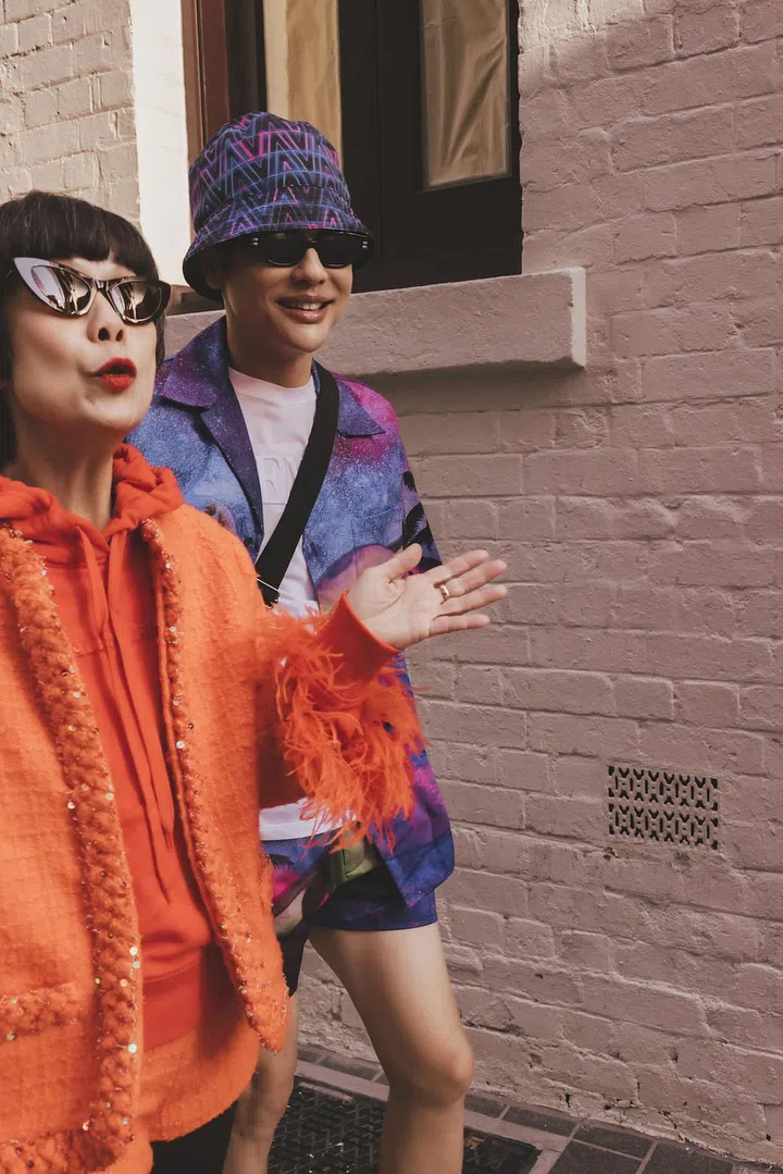 Goh and Ooi, both in Maison Valentino, taking a leisurely stroll on the backstreets of Sydney. (Photo: Arvin Prem Kumar)