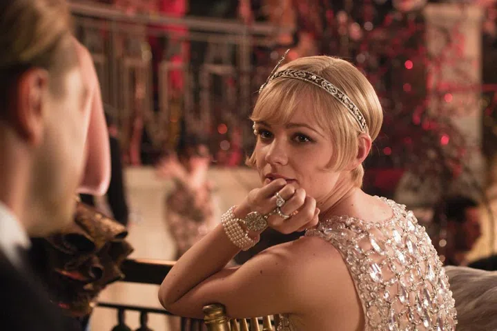 Baz Luhrmann’s adaptation of The Great Gatsby mostly failed to approach the biting wit and pathos of F. Scott Fitzgerald’s novel; chock-a-block with product placement and unnecessary stylistic flourishes, it fell victim to excess in much the same way its hedonistic subjects did. Carey Mulligan’s Daisy was a notable bright spot: vain and shallow, she is nevertheless more sympathetic than her novel counterpart. Anachronistically bedecked in Prada and custom Tiffany & Co. jewels, Daisy’s wardrobe was a gloriously heightened distillation of Roaring 20s style.
Image: Pinterest