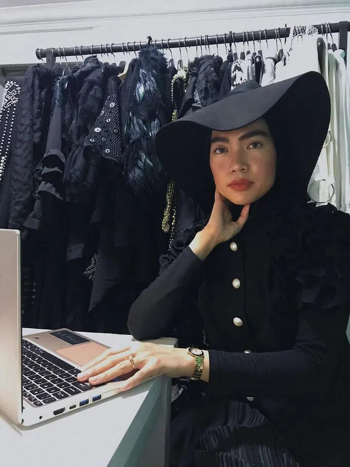 “I believe virtual meetings are just as important as in real life ones, so I always make an effort to look my best by wearing pieces that I would wear out and about. The focus will be your face and upper body so I would go with something like my signature look, which includes a hat and a top that has interesting details such as oversized sleeves. I think it’s also a good idea to stick to your usual makeup routine. I like to use coconut oil as a moisturiser then follow with a bit of foundation, highlighter, contour, blusher, eyebrows and lipstick – you don’t want to go too overboard.”

Photo: Courtesy