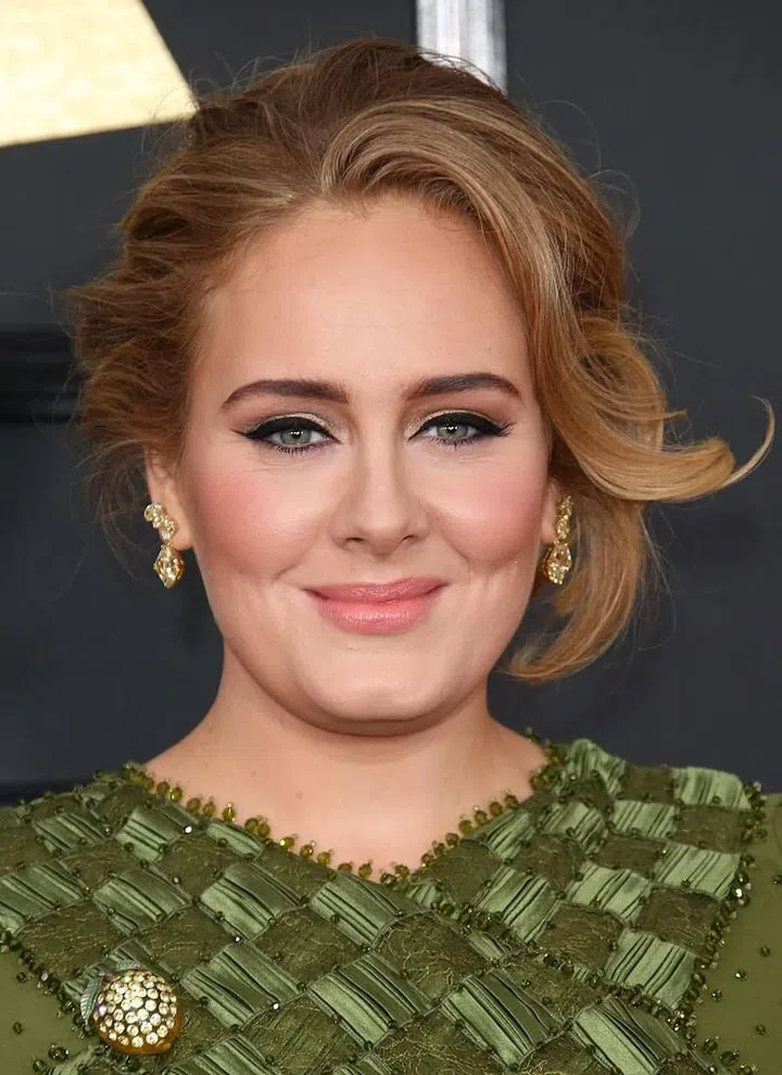 Adele's peachy, satin pout is also a custom mixture, done by Michael Ashton, her makeup artist. It's a combination of Marc Jacobs Le Marc Liquid Lip Crème in "Slow Burn" and "Fawn Over Me". Photo: Getty 
