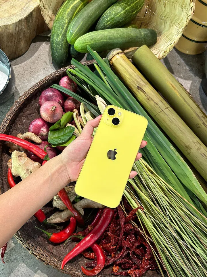 The iPhone 14 comes in a variety of new colours, including this bright ray of yellow sunshine. Photo: Gloria Tso