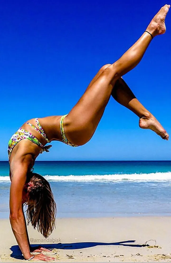 This fit Aussie is a former pole vaulter turned yoga instructor focusing on stretching, health and body toning—and she's got the body to show for it. Photo: Instagram