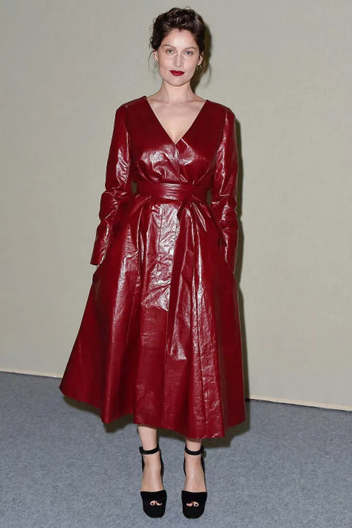 Fall calls for a dress in a rich fabrication and hue—whether it be leather, velvet or cashmere—it should feel of the season.
Pictured: Laetitia Casta. Photo: Getty