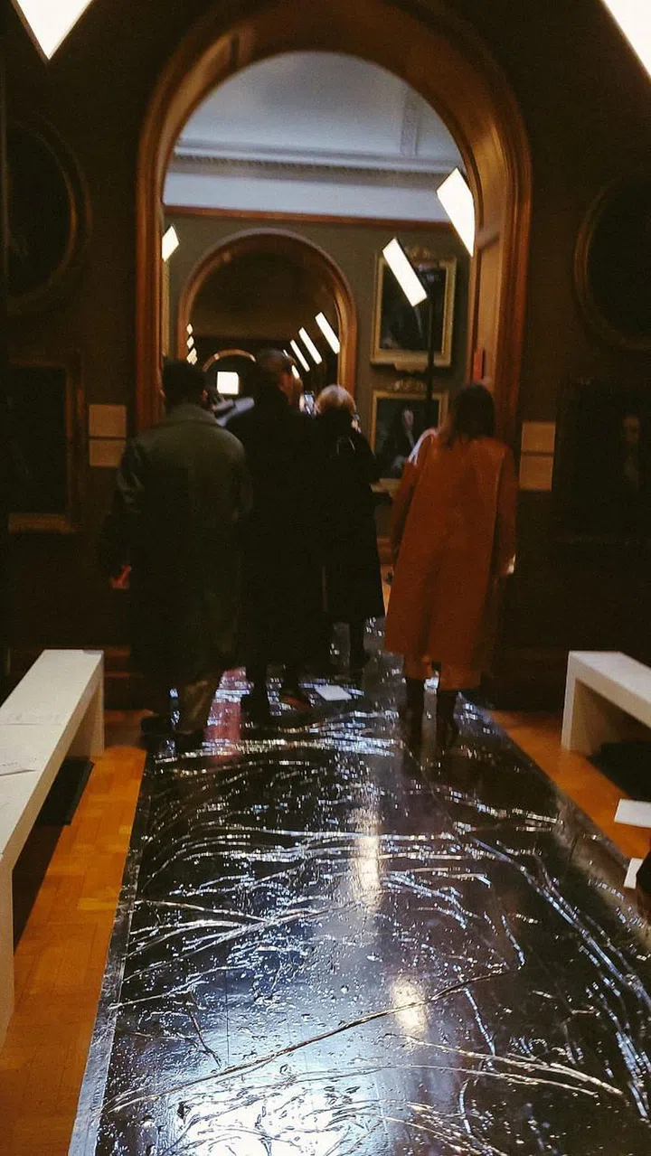 Silver foil covered the entire length of the Erdem runway. It was a tribute to the collection's muse, the photographer Cecil Beaton, who was known for using the glittering material in his decorative sets.