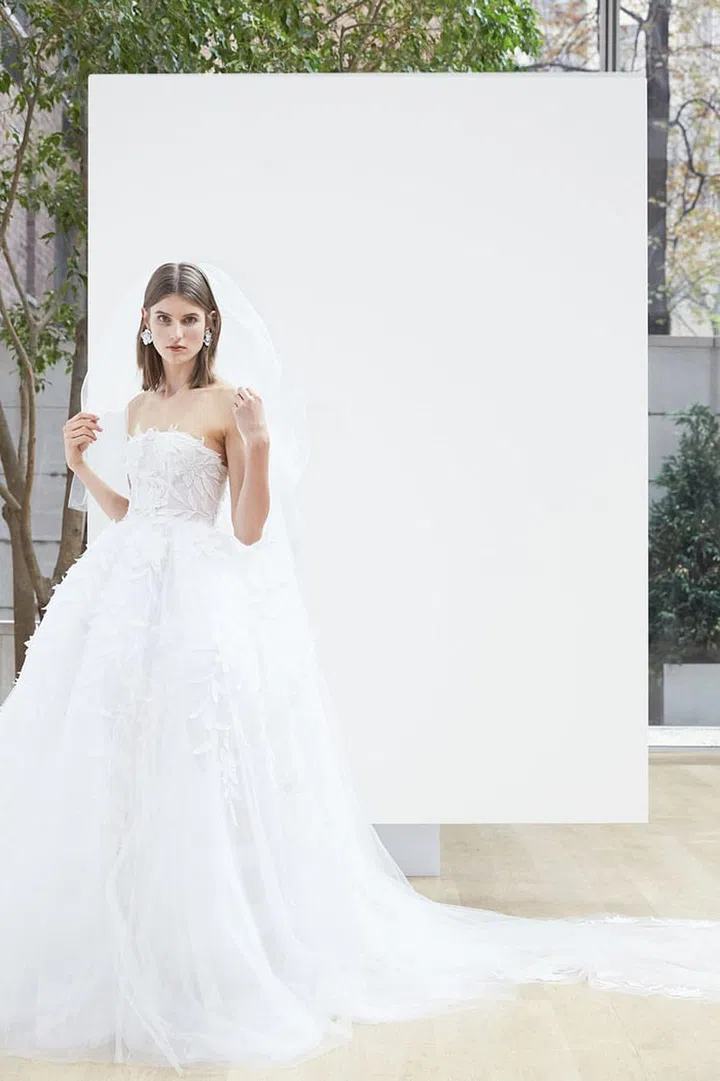 Soft yet voluminous are the trick to making dramatic, full skirts work for barn weddings. Oscar de la Renta "Lillian" ball gown, oscardelarenta.com.  
