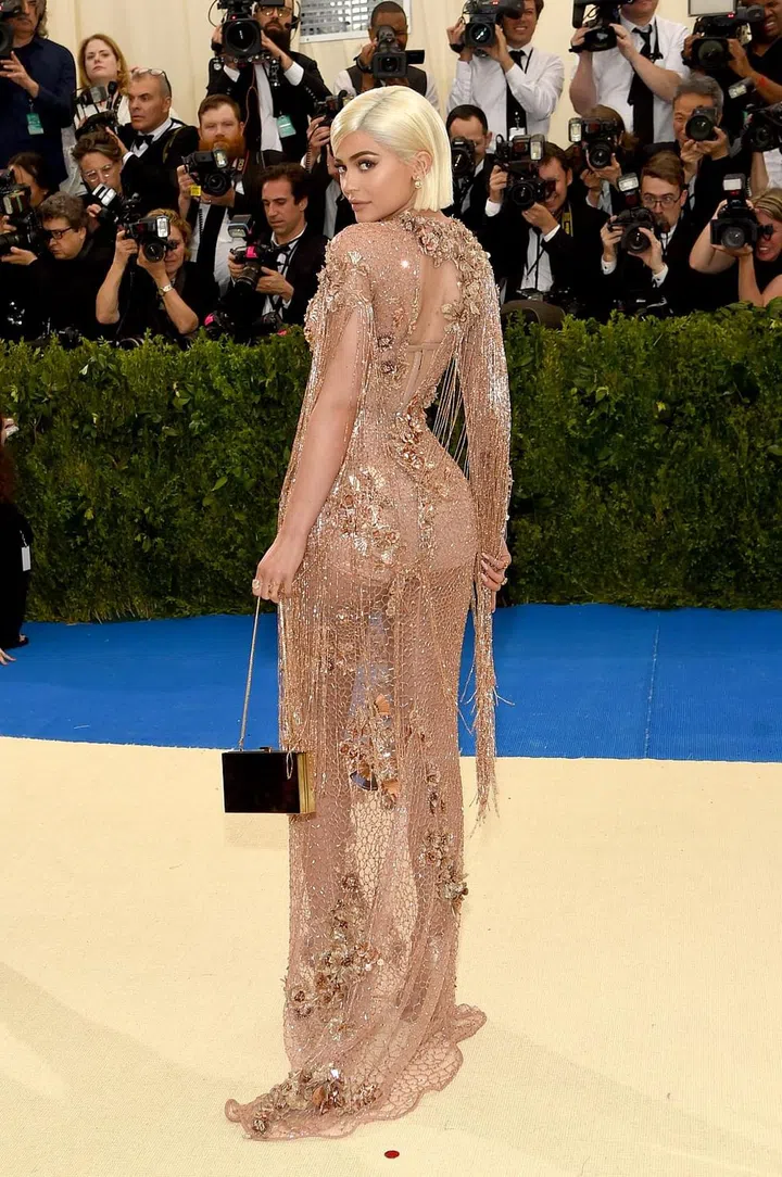 Kylie Jenner started the ball rolling with this nude pink "naked" dress covered in every embellishment you can think of. Photo: Getty 