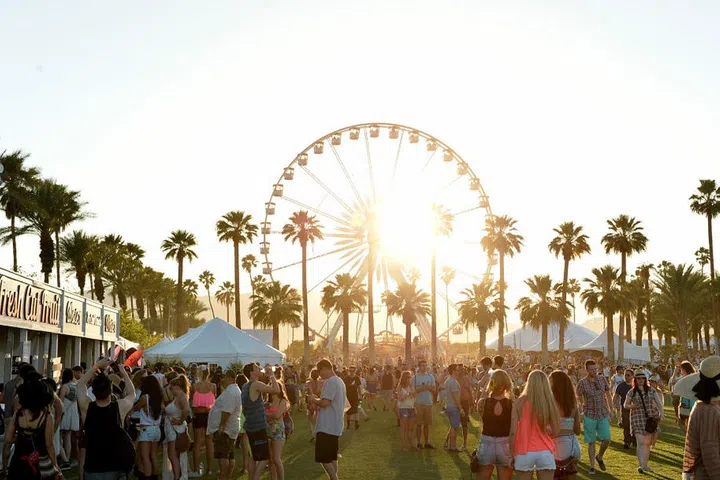 WHEN: April 15-17; April 22-24, 2016
WHERE: Indio, California
WHY: The pinnacle of summer music festivals, Coachella's draw is as much about its style scene as it is about the music. Every year, hundreds of thousands of flower crown-clad, denim cut-off wearing folk flock to the Indio desert to bask in the SoCal sun, catch some tunes, and rub flash-tatted elbows with celebrities and fashion bloggers alike—all of which will undoubtedly be well documented and highly filtered on Instagram.
WHO'S PLAYING: Ellie Goulding, Calvin Harris, Sia, Major Lazer, Sufjan Stevens, LCD Soundsystem, Guns N' Roses, Disclosure, CHVRCHES, Halsey, and more. 
For additional information and tickets visit coachella.com.
Photo: Getty