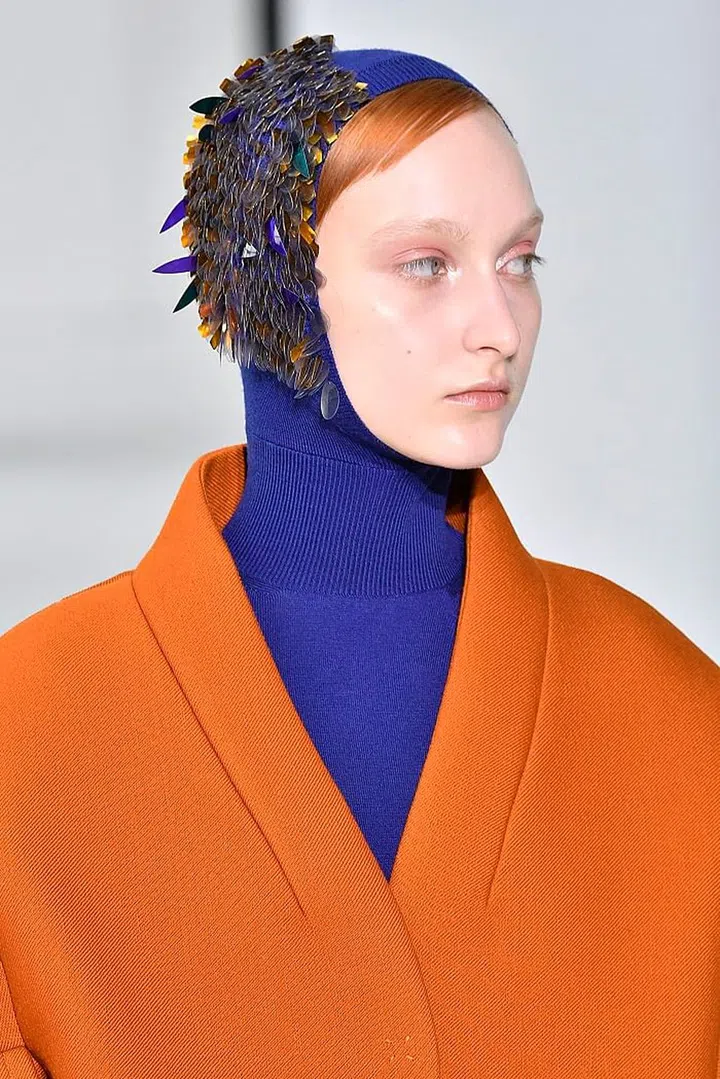 It's all about luminous, almost wet-looking skin when it comes to Delpozo's show. The models give off a sheen at every angle. The look features ultra dewy skin and highlighted cheekbones, forehead and inner corners of the eyes. This fresh-faced look is completed with a dusting of pink on the eyes and a matching pink, sheer lip.  Photo: Getty 