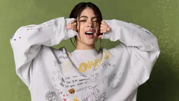 Niana Guerrero Coach Sweater