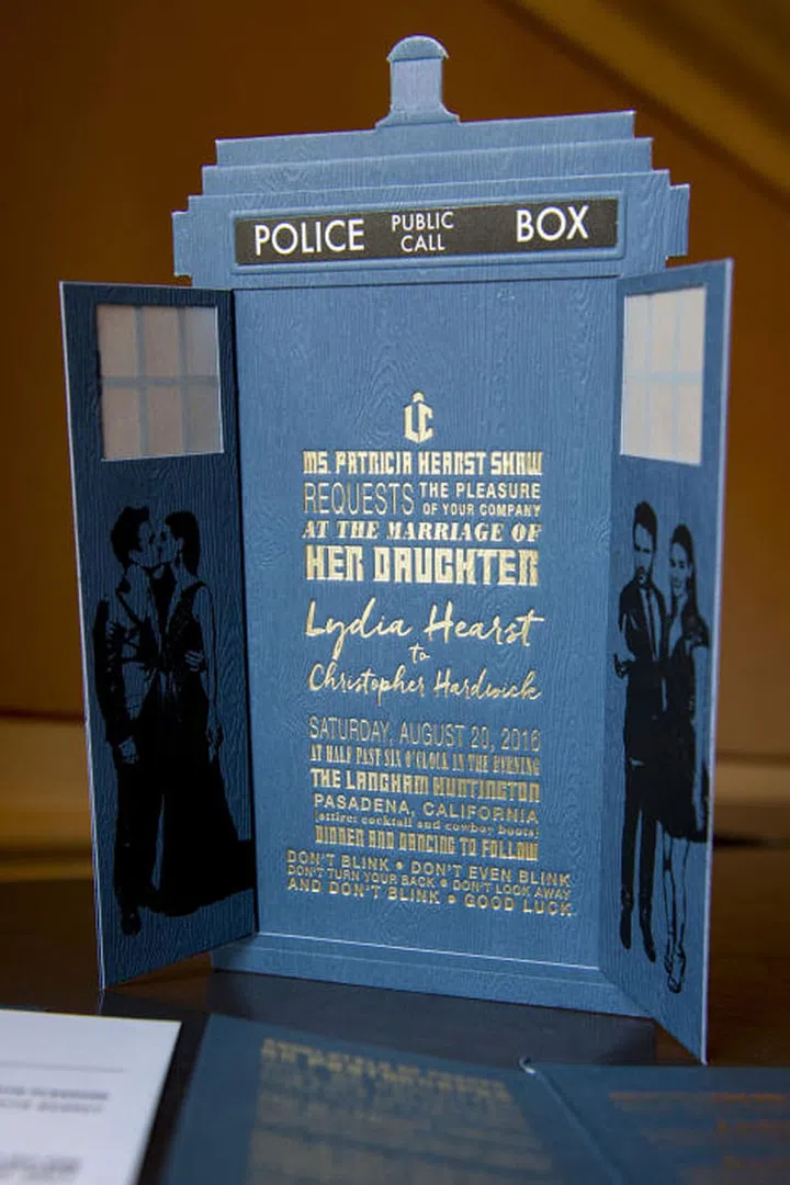 The unconventional nature to Lydia and Chris' wedding began with the invitation suite, an ode to the Tardis in Dr. Who. Read the fine print: one of the series best-known quotes is etched into the last line of the invitation. The attire? Cocktail & Cowboy Boots. Photo: Lara Porzak