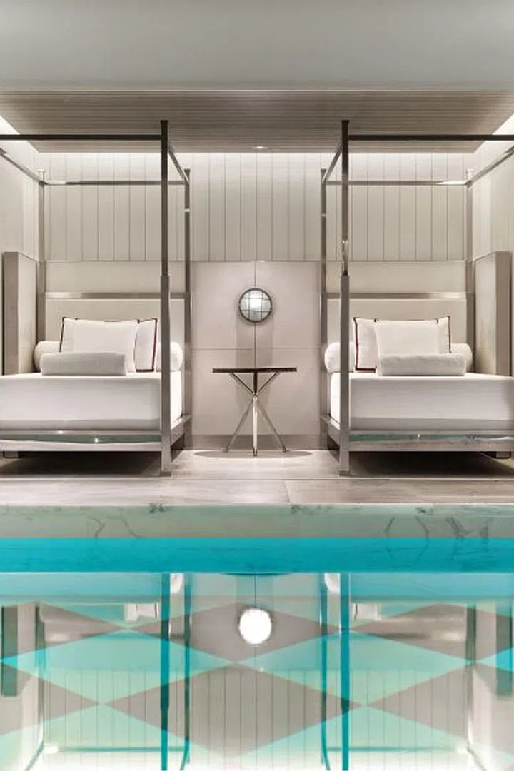 New York City's most luxurious new hotel boasts an equally amazing new pool. The walls surrounding the subterranean pool feature the artwork of painter François Houtin, known for his detailed prints of utopian gardens. The forest scene is a tribute to the woods near Baccarat's factory in the French countryside. Lining the perimeter of the black-and-white marble-tiled pool are canopied day beds inspired by the Côte d'Azur, and next door, the world's only Spa de la Mer offers indulgent treatments. With a meditative atmosphere that transports guests miles away from the city's busy streets above, this urban oasis is pure escapism. 