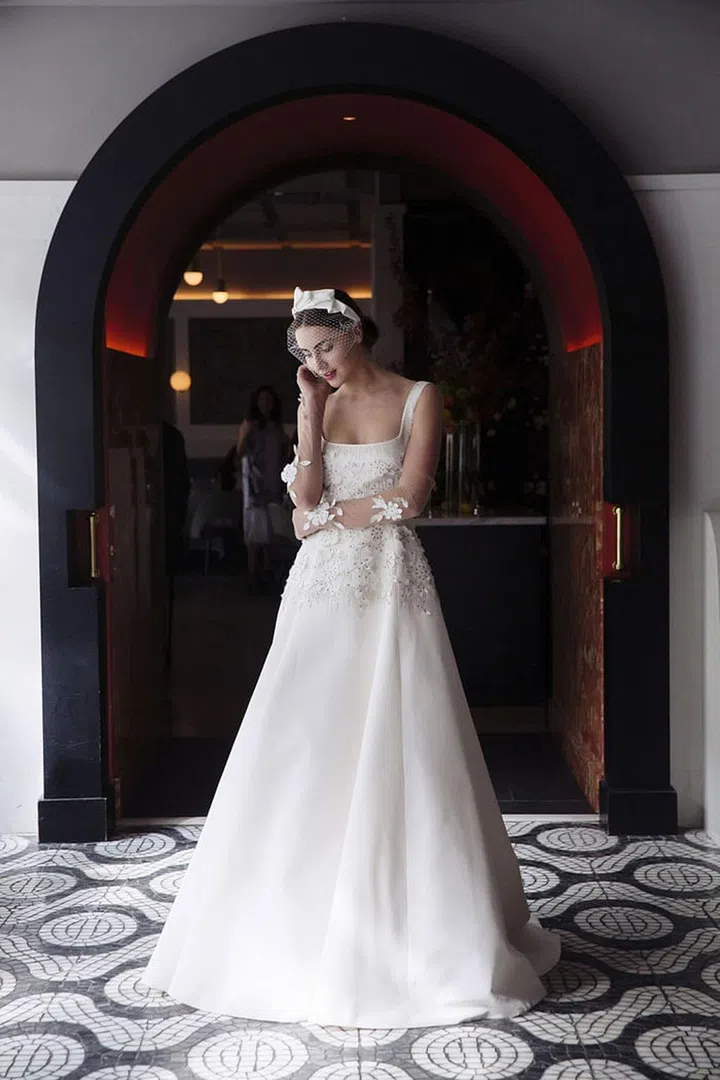 Atypical necklines are fashion-forward and the the more delicate ones , like u-necklines over plunging, strapless or square-necked bodices feel apropos for the easy outdoors. Lela Rose, "The Mirador" gown, lelarose.com. 