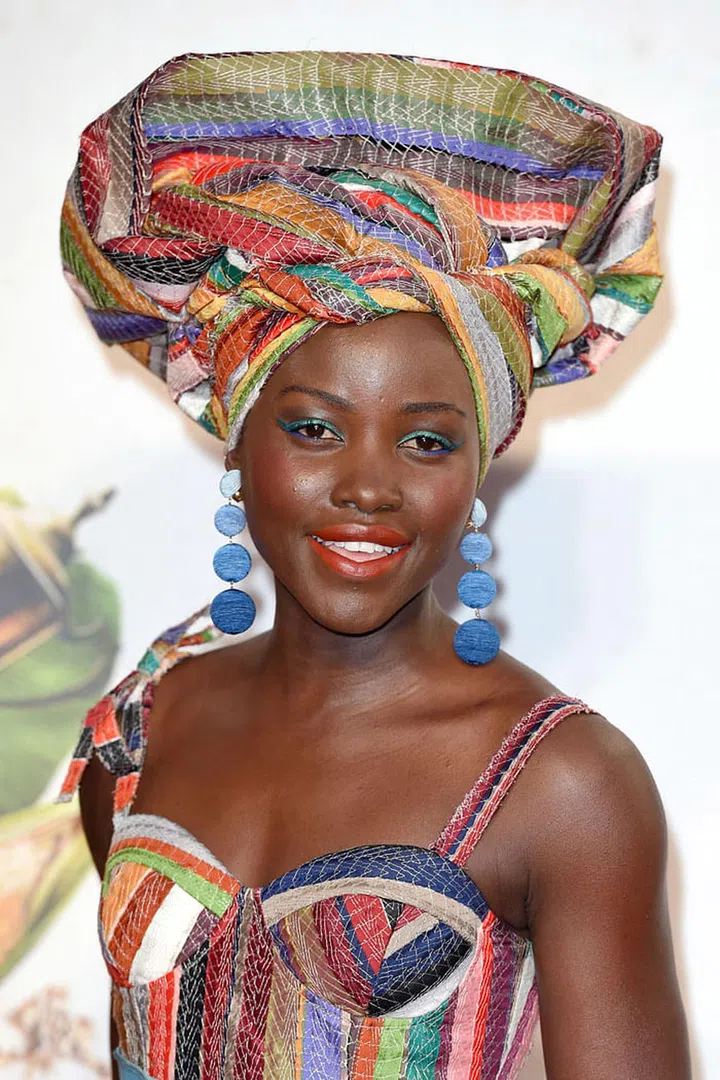 Nobody wears color as fearlessly as Nyong'o. Two-toned blue eye makeup was magnificent when paired with the star's orange-red lips.
