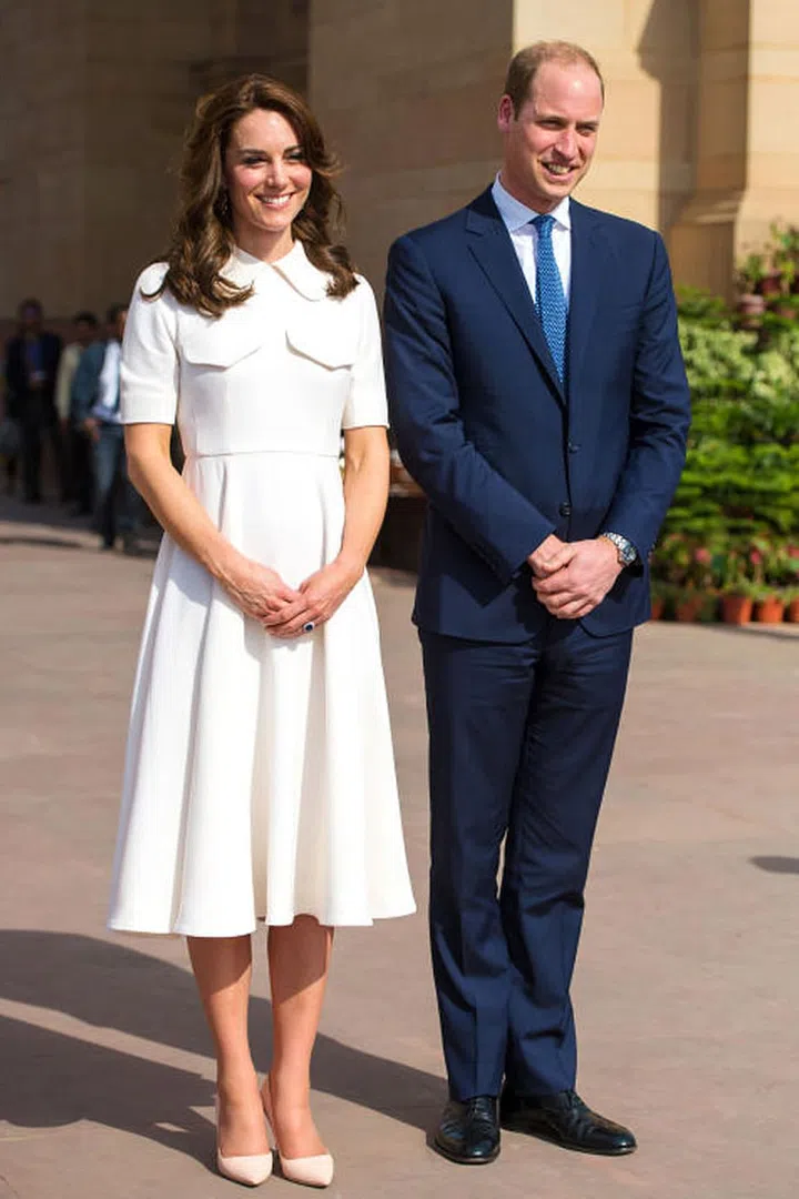 On Monday, the Duchess and Prince William visited Gandhi Smiriti, a Mahatma Gandhi museum in New Delhi. Kate Middleton sported a white 50s style swing dress with pocket details and nude pointed pumps. Photo: Getty