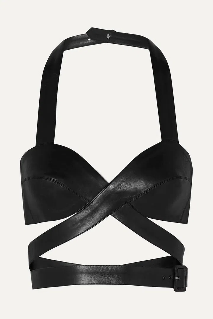 Cropped belted leather halterneck top, $2,672, Alaïa at Net-a-Porter
