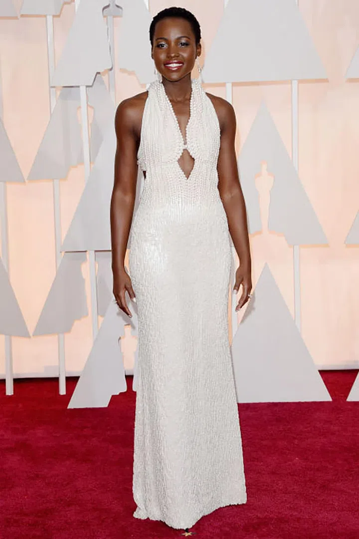 Lupita Nyong'o's Calvin Klein gown, worth £115,000, was created using 6,000 pearls. Photo: Getty