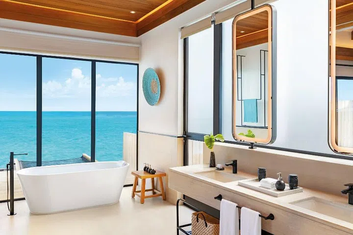 Shower with unobscured views of the Indian Ocean.