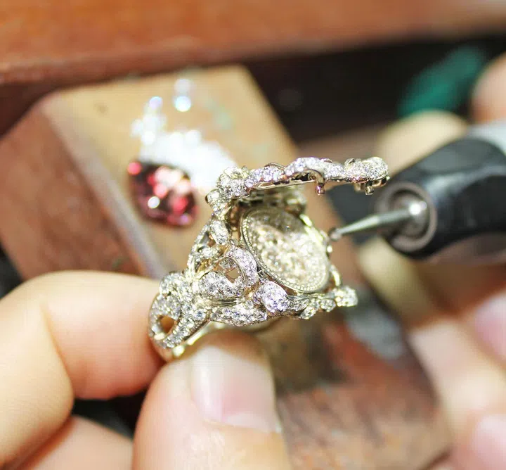 A craftsman working on the intricate interior of the St Paul Cathedral ring